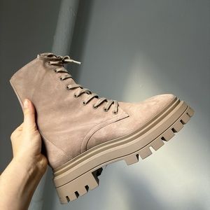 Stuart Weitzman lace up combat lug sole booties